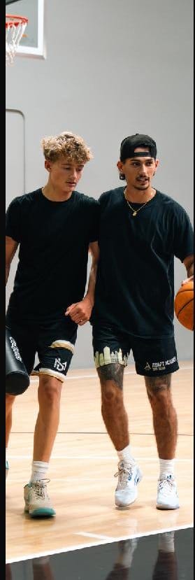 High school athletes on the floor at a DETAIL San Diego session